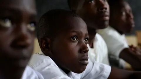 Care Boys participate in roundtable discussions to talk about ending gender-based violence in Rwanda.
