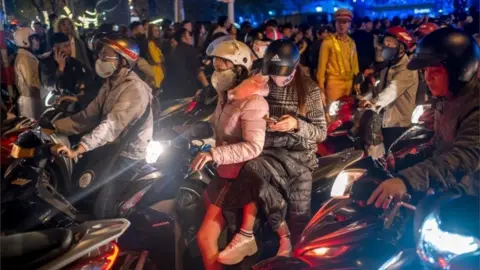 Getty Images Crowds on motorbikes in Danang, Vietnam (Jan 2019)