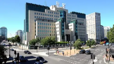 PA Media The MI6 building in Vauxhall Cross