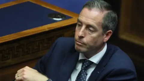 Press Association Paul Givan