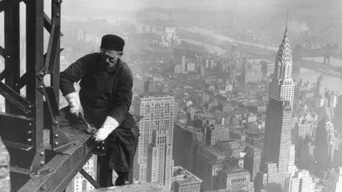 Getty Images Man constructing the