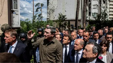 Reuters Ukrainian Minister for Communities and Territories Development Oleksiy Chernyshov talks to French President Emmanuel Macron, German Chancellor Olaf Scholz, Italian Prime Minister Mario Draghi and Romanian President Klaus Iohannis