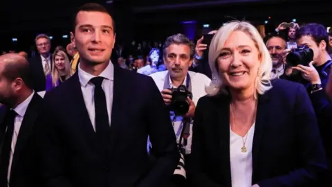EPA Jordan Bardella and Marine Le Pen