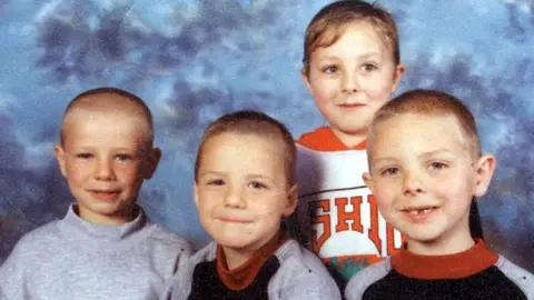 Quinn family Quinn brothers in family photo