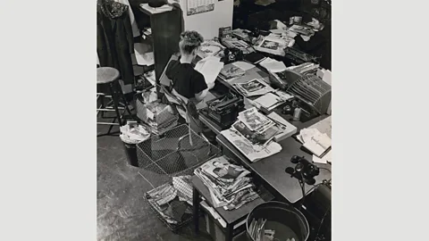 The Picture Collection Inc Life photo editor Natalie Kosek reviews photographs, 1946 by unknown photographer (Credit: The Picture Collection Inc)