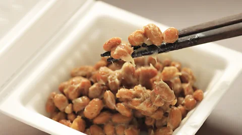 Yankane/Getty Images A set of nattō typically contains three small polystyrene foam containers, each with a single serve of the fermented soybeans (Credit: Yankane/Getty Images)