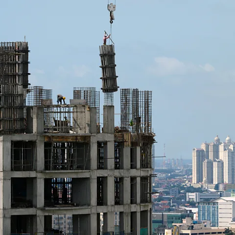 Romeo Gacad/Getty Images Concrete is one of the most commonly used building materials in the world but is a major source of carbon emissions (Credit: Romeo Gacad/Getty Images)