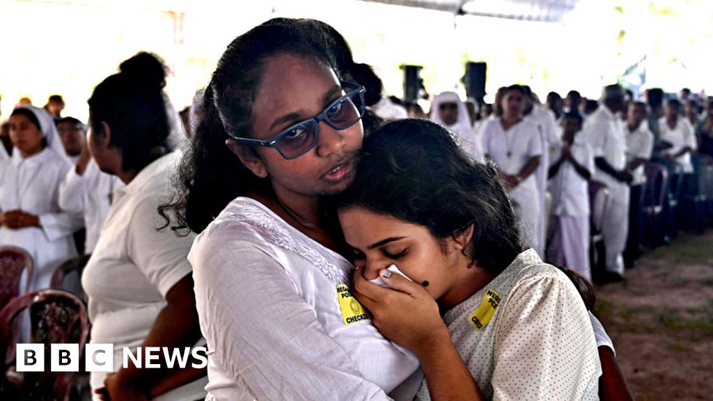 Mass funerals held as nation mourns Mass funerals held as nation mourns
