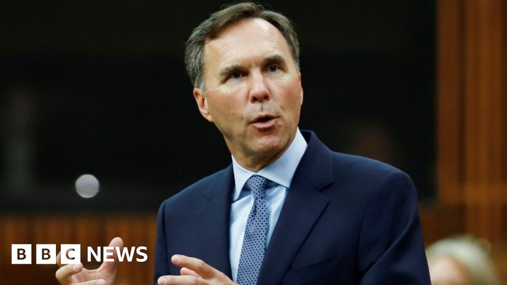 Canada finance minister quits amid charity probe Canada finance minister quits amid charity probe