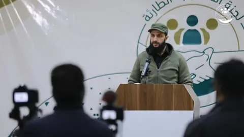 Salvation Government Abu Mohammed al-Jolani taking questions at a press conference following the February 2023 earthquakes in northern Syria