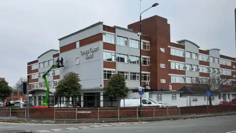 LDRS The four-storey brick and concrete Cresta Court Hotel in Altrincham was built in the 1970s. It is located at a busy junction on the edge of the town centre.