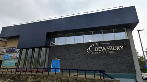 Google An external view of Dewsbury Sports Centre, with its name in large letters on the side of the building