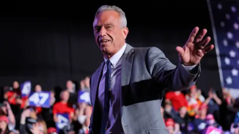 Reuters File image of RFK Jr waving at crowds at a Trump rally in Michigan