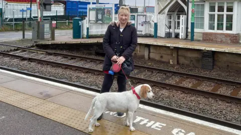 Tracy Carter Tracy Carter and a dog at a railway station in Bedfordshire