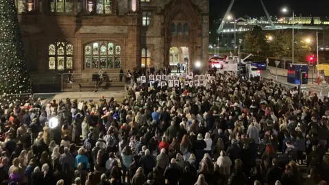 People in Guildhall Square