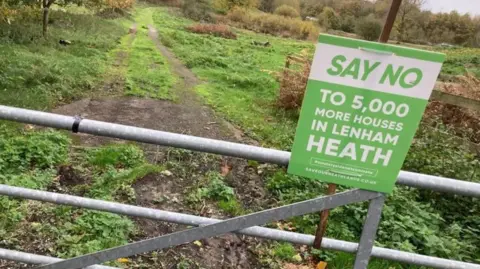SIMON FINLAY / LDRS a "Say No" sign on a gate into a field
