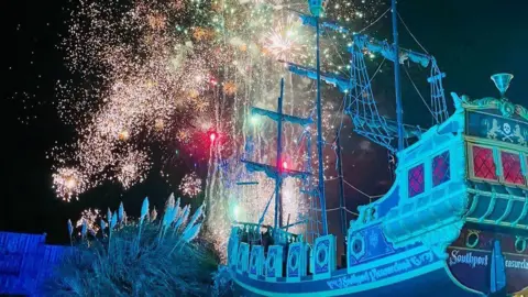 Southport Pleasureland Firework display behind Southport Pleasureland Pirate Ship
