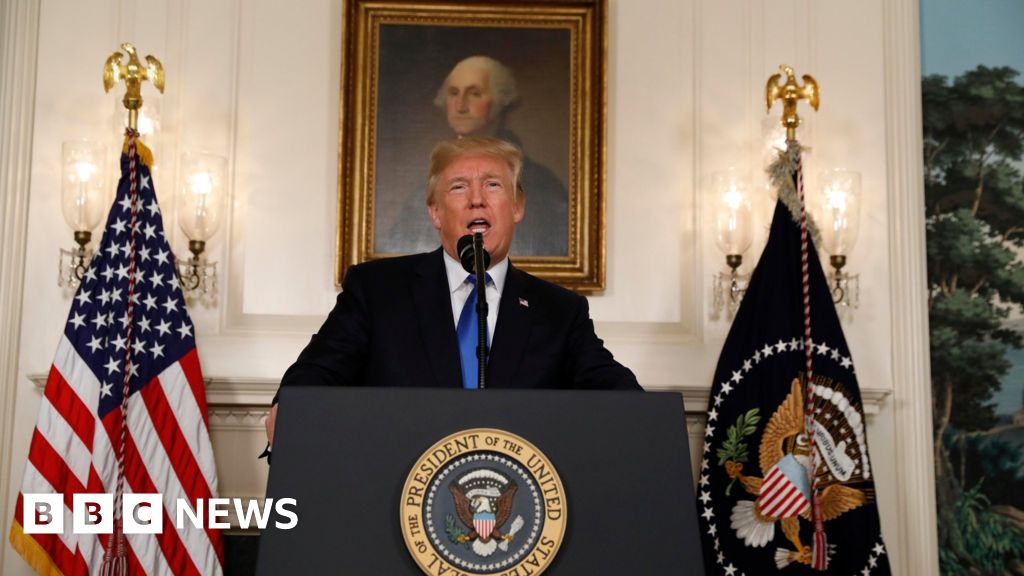 Trump aims blow at Iran and threatens landmark nuclear deal