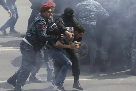 Reuters Police make a arrest in Yerevan, 22 April