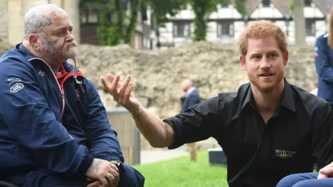 Getty Images Prince Harry and a member of the UK's team at the Invictus Games