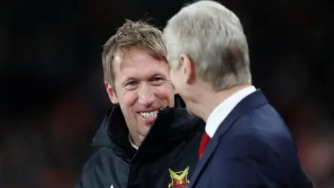 Reuters Graham Potter with Arsene Wenger