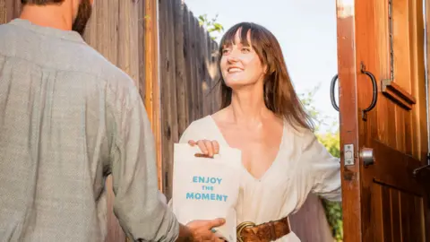 Eaze Woman receiving goods