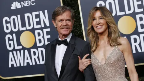 Reuters  Actors Felicity Huffman and William H Macy at the Golden Globe Awards in January 2019