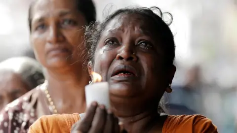 Reuters Mourners in Sri Lanka
