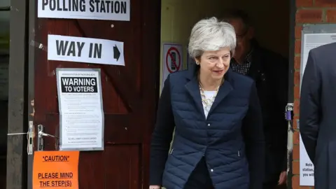 PA Prime Minister Theresa May leaves after casting her vote at a polling station near her home in the Thames Valley as voters headed to the polls for council and mayoral elections across England and Northern Ireland.