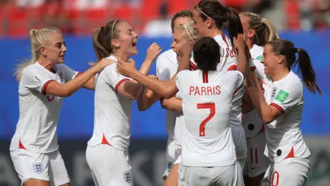 Marc Atkins/Getty Images England players celebrate during the opening goal of their Women's World Cup match against Cameroon