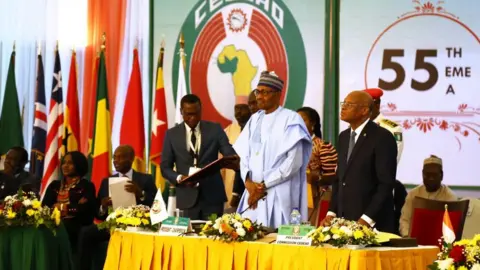 AFP President of Nigeria Muhammadu Buhari (C) chairs the 55th Ordinary Session of the Economic Community of West African States (Ecowas) Authority of Heads of State and Government in Abuja