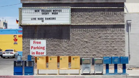 Nick Leonard Side view of Showgirl Video advertising boarding