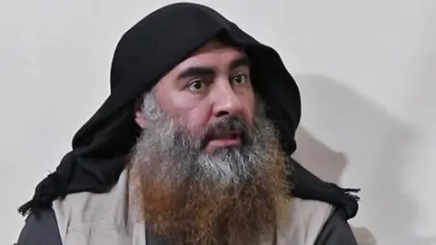 AFP Screengrab of video released on 30 April 2019 showing Abu Bakr al-Baghdad at an undisclosed location
