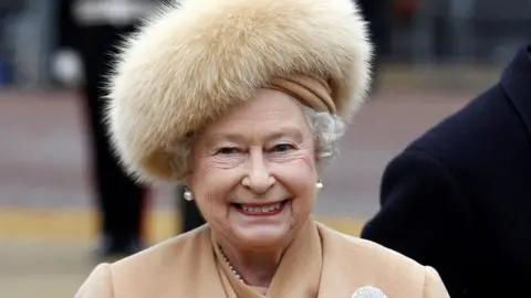 PA Media Queen Elizabeth II in a fur coat, as she no longer uses fur in her outfits, having switched to fake fur this year, her senior dresser has revealed
