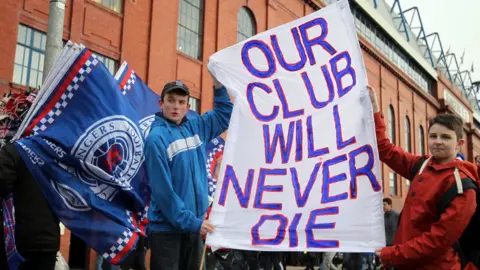 AFP Rangers fans protest against former owner Craig Whyte and show their support for Rangers outside Ibrox Stadium prior to the Scottish Premier League football match between Rangers and Kilmarnock at Ibrox Stadium in Glasgow, Scotland on February 18, 2012.