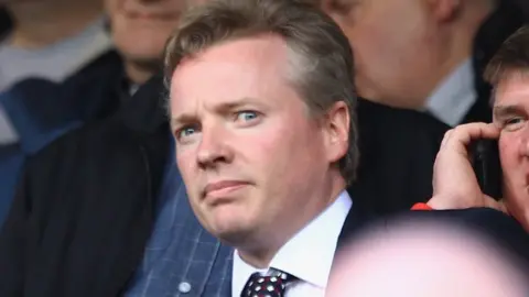 Jeff J Mitchell Craig Whyte new owner of Rangers arrives in the stand during the Clydesdale Bank Premier League match between Rangers and Hearts at Ibrox Stadium on May 7, 2011