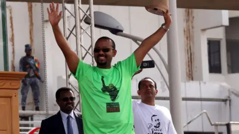 Getty Images Abiy Ahmed waving