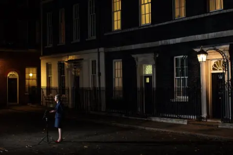 Getty Images Theresa May delivers a speech outside Downing Street
