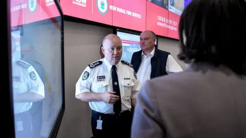 EPA Shane Fitzsimmons speaking at the Rural Fire Service command centre in Sydney