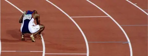 Getty Images Michael Johnson after winning gold and breaking the 200m world record at the 1996 Olympics