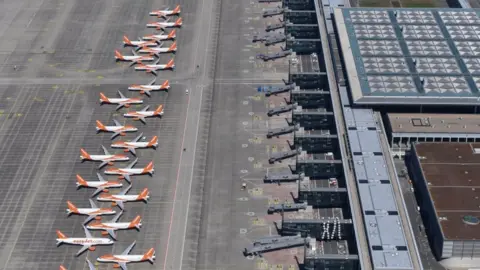 EPA An aerial view shows air planes of EasyJet sitting on the tarmac at the Berlin Brandenburg International Airport in Schoenefeld, Germany, 23 April 2020