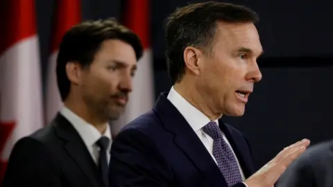 Reuters Canada"s Minister of Finance Bill Morneau attends a news conference with Prime Minister Justin Trudeau in Ottawa, Ontario, Canada March 11, 2020