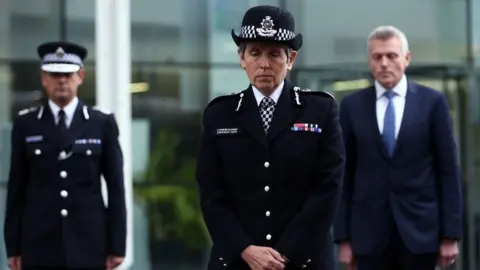 PA Media Metropolitan Police Commissioner Dame Cressida Dick (centre), Assistant Commissioner Nick Ephgrave (left) and Robin Wilkinson, Chief of Corporate Services