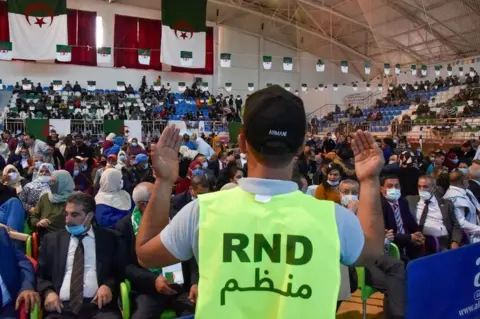AFP Supporters of the Algerian Democratic National Rally (RND) political party rally in October 2020.