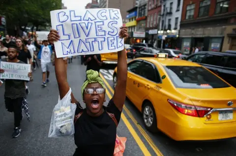 Getty Images People take part in a protest on 8 July 2016 in New York City