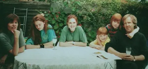 PA Media Philip Lawrence and his family