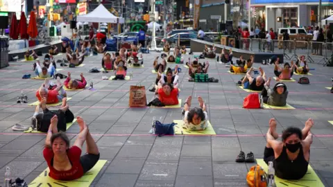 Anadolu Agency People participate yoga at the Times Square as part of the ''International Day of Yoga'' event on the Summer Solstice in New York City, United States on June 20, 2021.