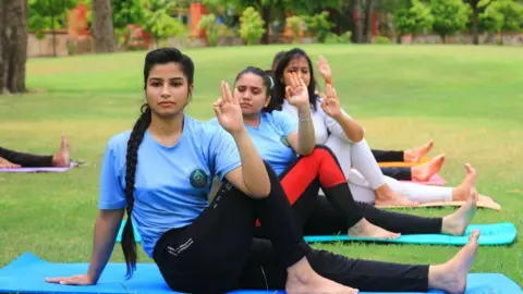 NurPhoto Anant yogalaya students perform yoga ahead the International Yoga Day in Jaipur, Rajasthan, India, on June 20, 2021