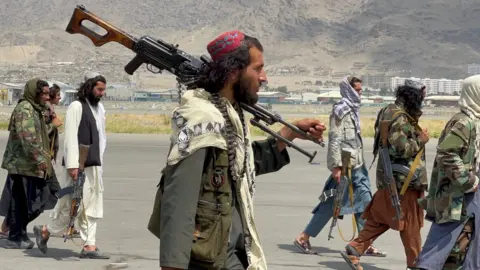 Reuters Taliban soldiers at Kabul airport