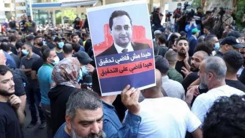 Reuters Protest in Beirut against the judge investigating last year's blast at the city's port (14 October 2021)